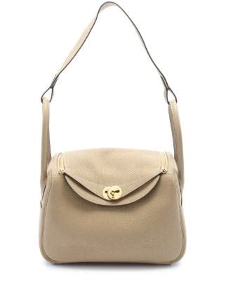 hermes 26 gold shoulder bag.